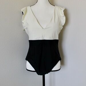 Off White & Black The Ruffle Backflip Colorblock One Piece Swimsuit
